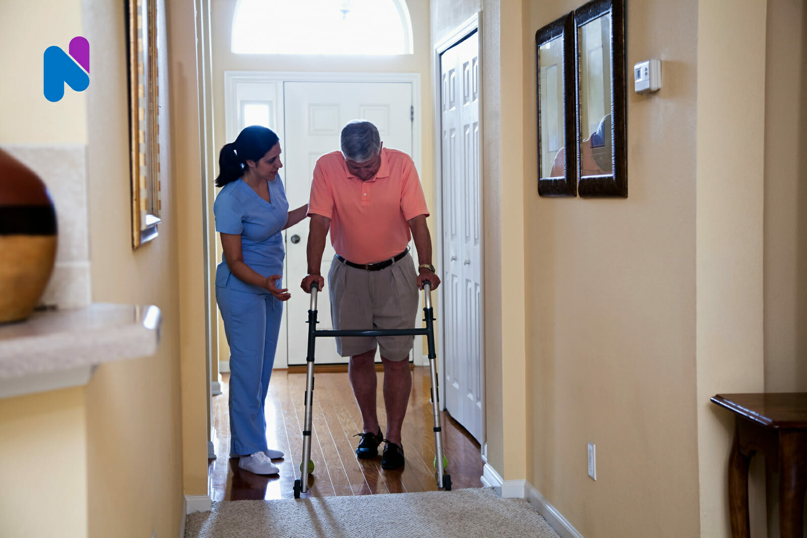 nurse-helping-man-at-home