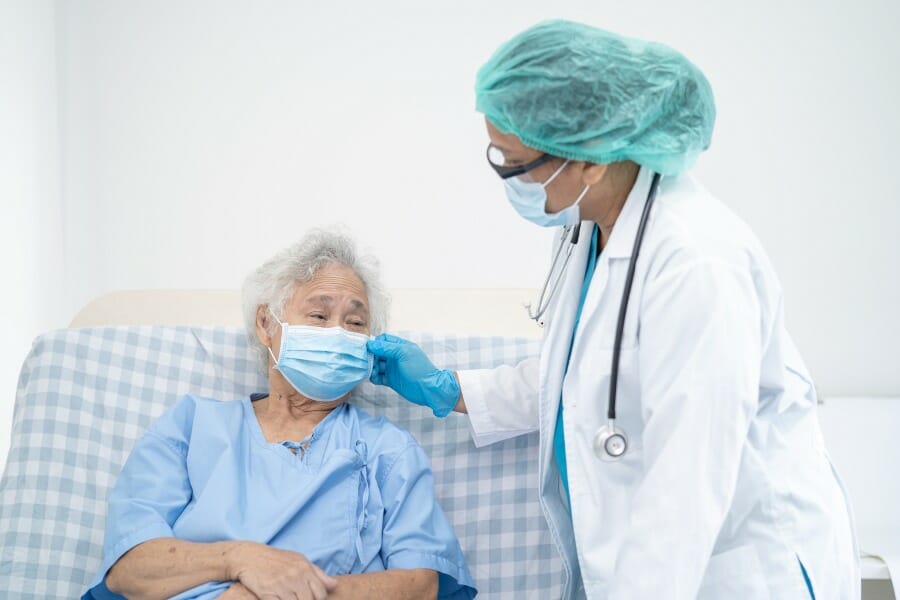 Patient with pneumonia receiving treatment