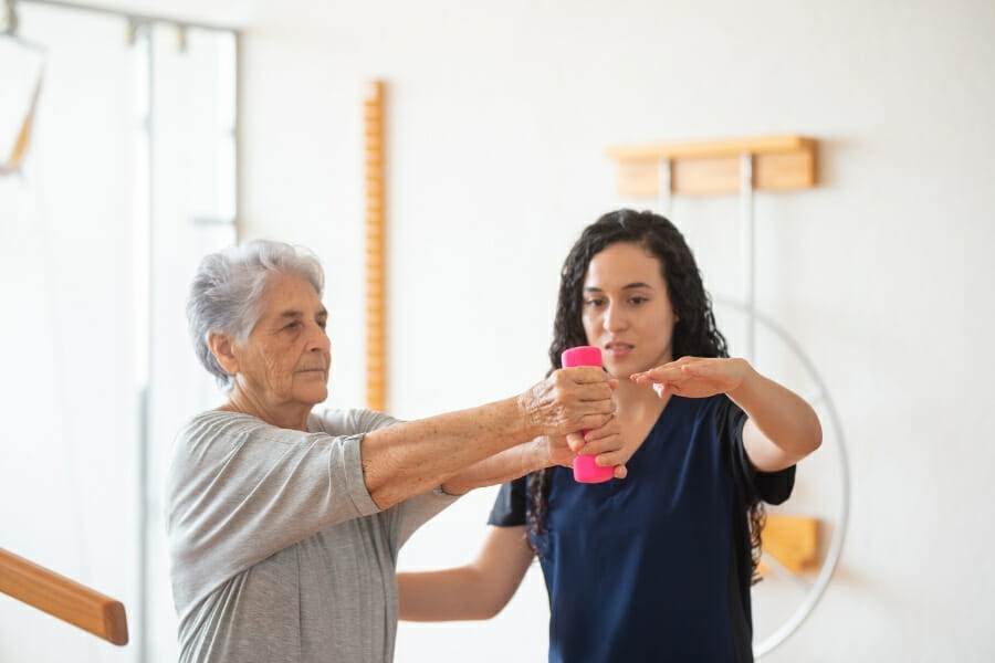 Occupational Therapist assisting patient