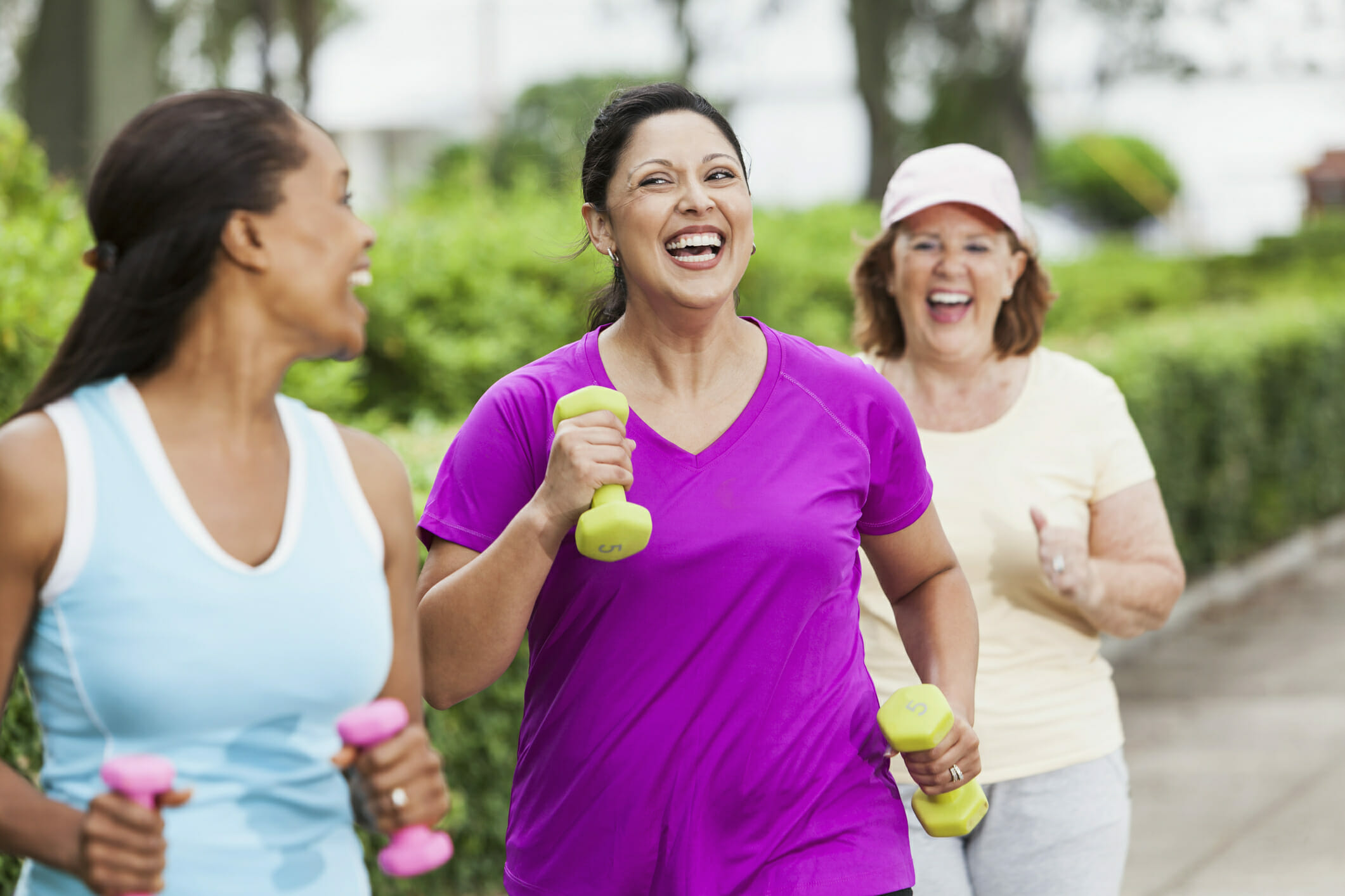 Women exercising in park