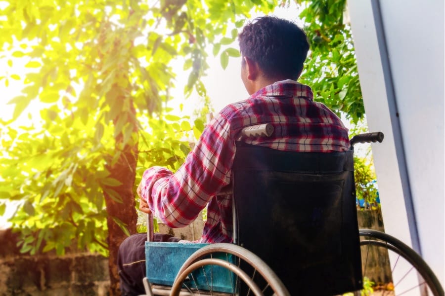 A man with MS looking out at the sun's heat