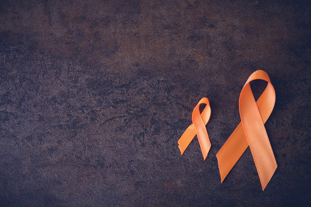 small and large orange ribbon for multiple sclerosis