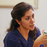 nurse holding coffee mug