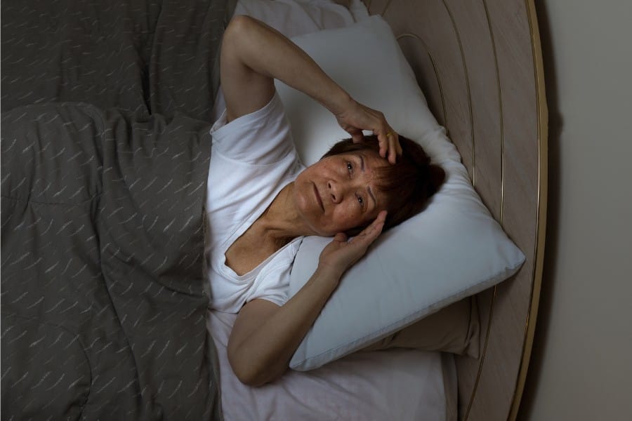 Woman with poor sleep