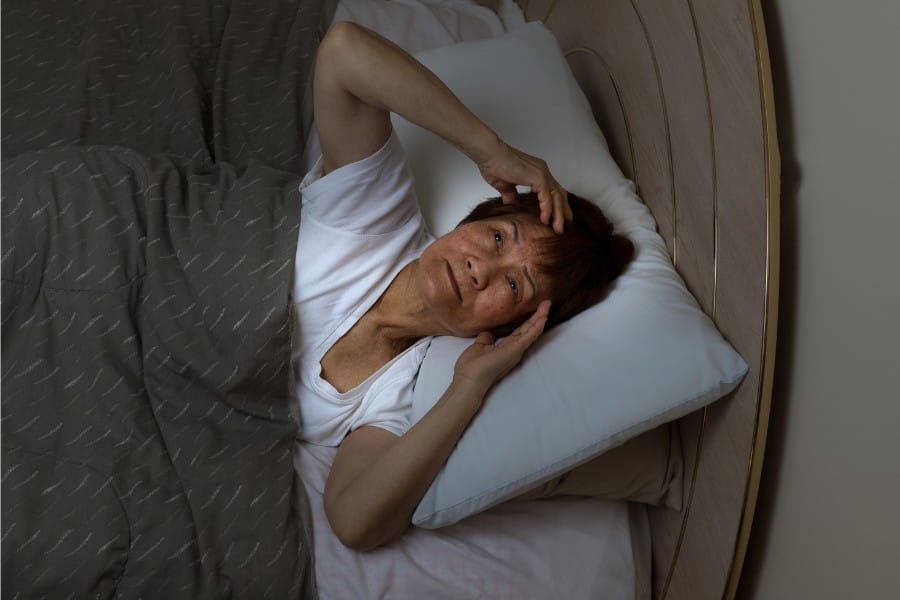 Woman with poor sleep