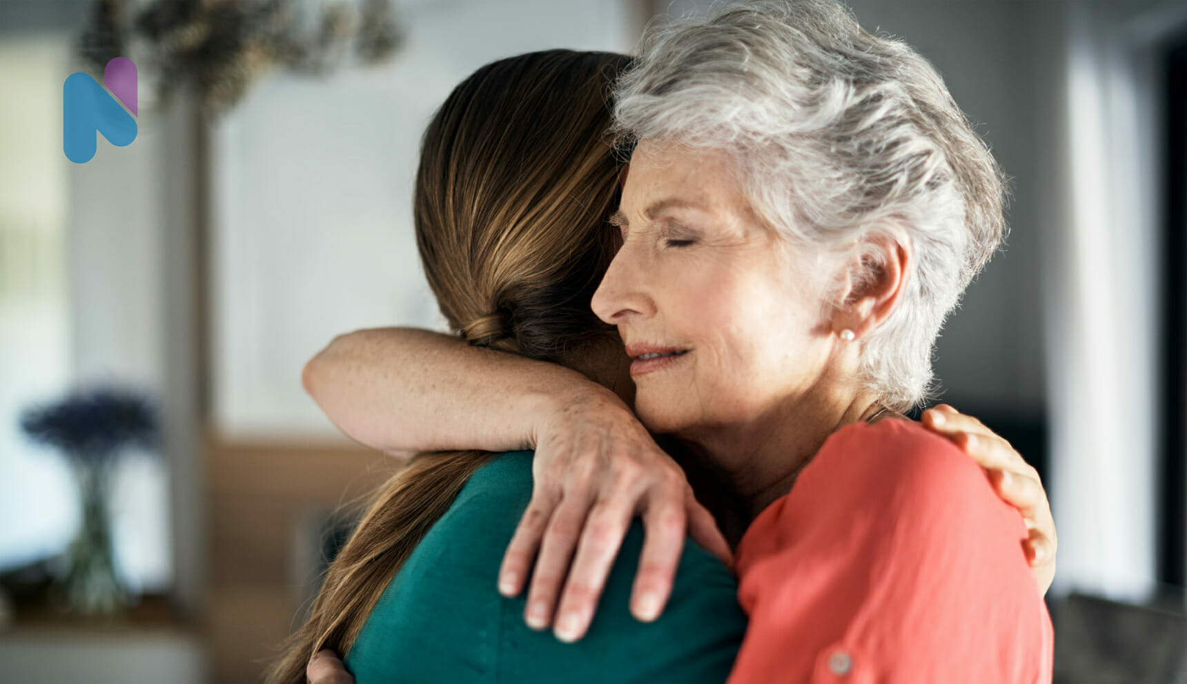 older-woman-hugging-daughter-in-pain