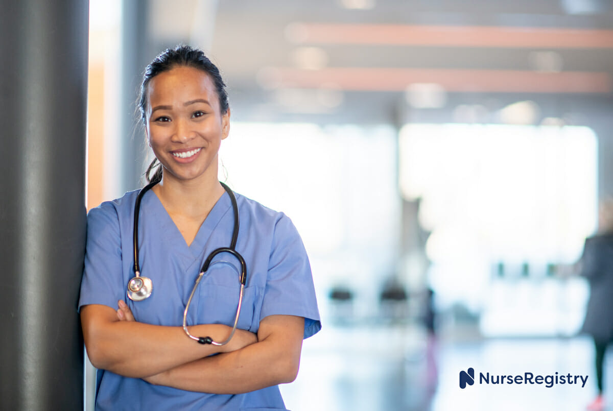 nurse standing with arms crossed