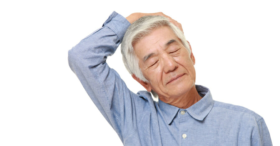 Older Man doing neck stretch