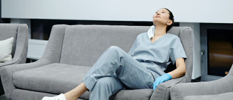 nurse relaxing on sofa