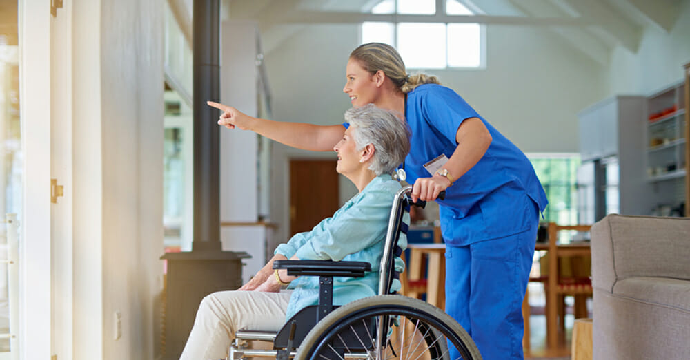 nurse pointing at where to look outside for patient