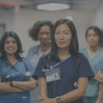 nurse staff standing in group