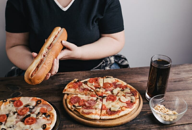 a woman suffering from binge eating disorder