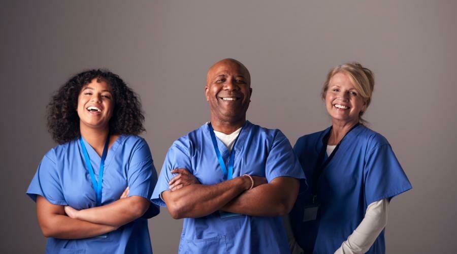 a team of nurses smiling