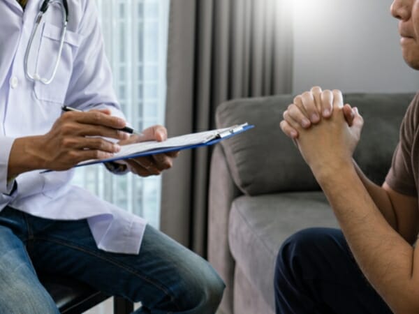 nurse working with a patient at a alcohol treatment center