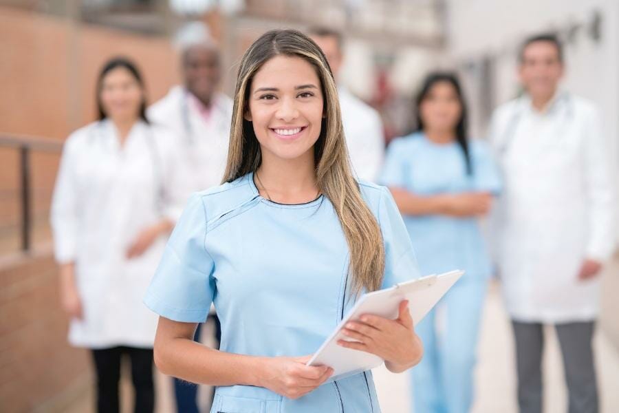 A smiling nurse being placed in a facility in Atherton, CA.