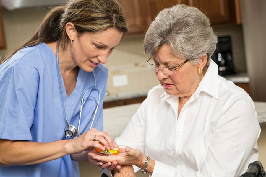 a nurse providing medication management