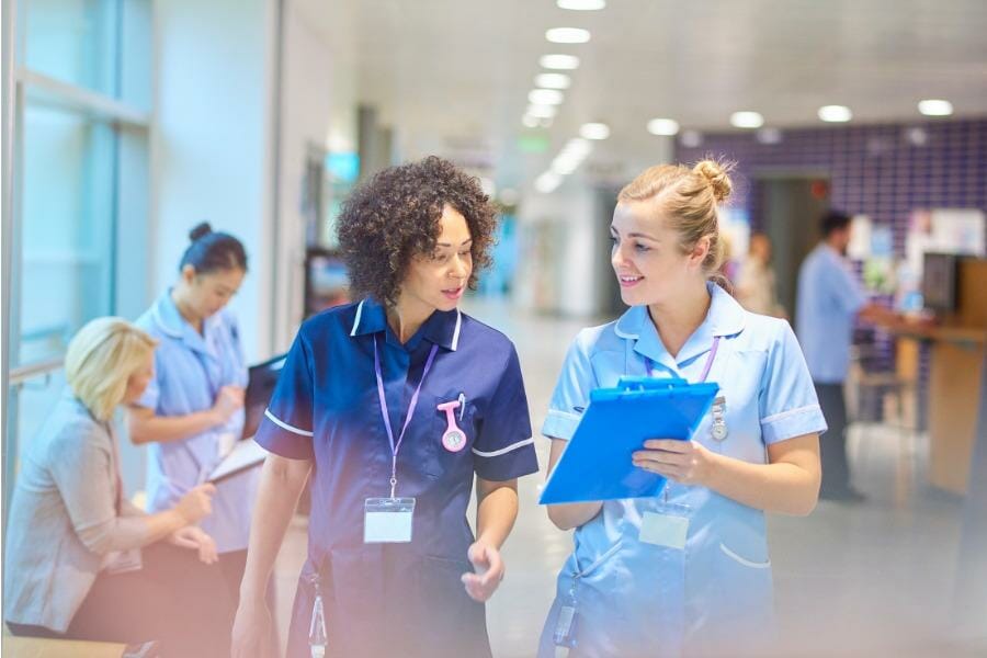 A nurse and per diem nurse working together.