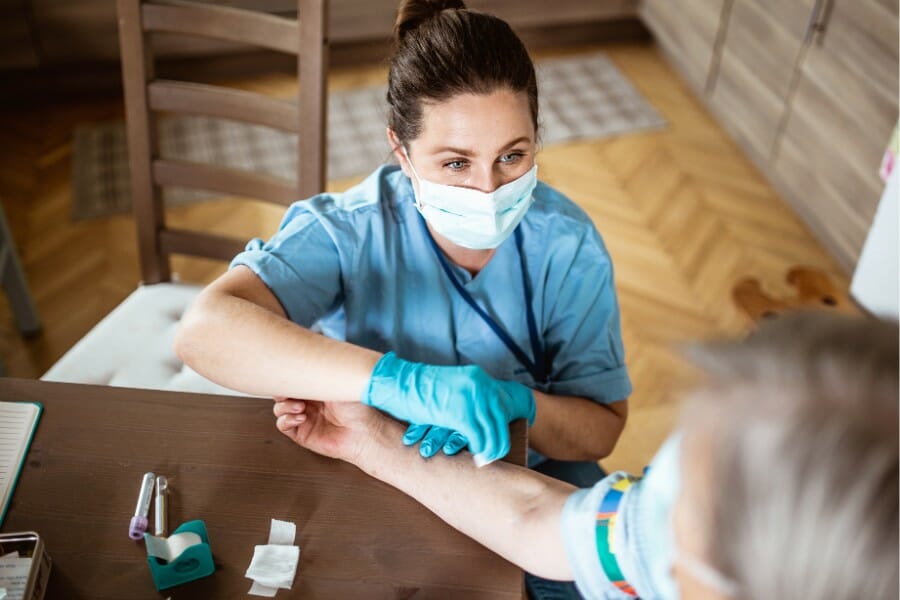 a patient getting an injection in San Marino