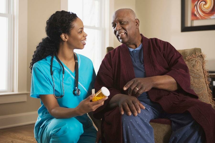 Nurse offering medication management.