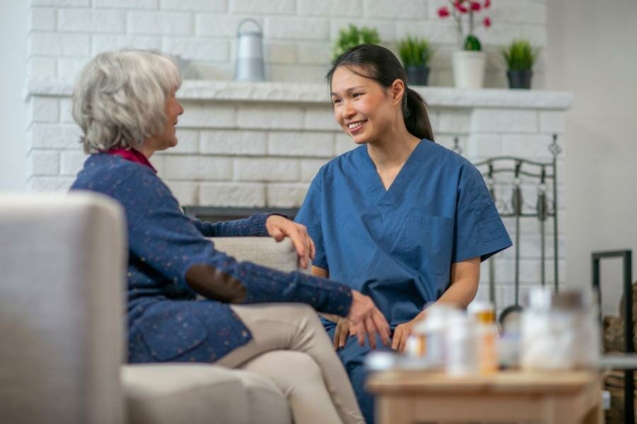 Nurse offering an in home teaching.