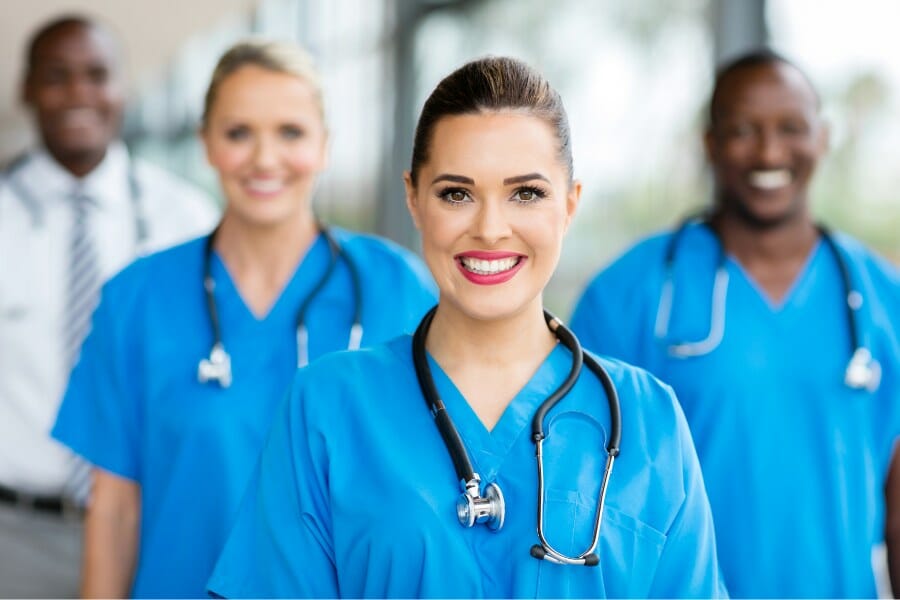 Smiling LVNs at a San Carlos medical facility.