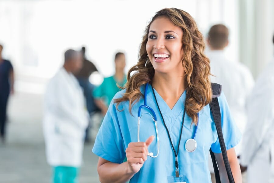 pleasanton nurse staffing agency A smiling nurse in Pleasanton, California