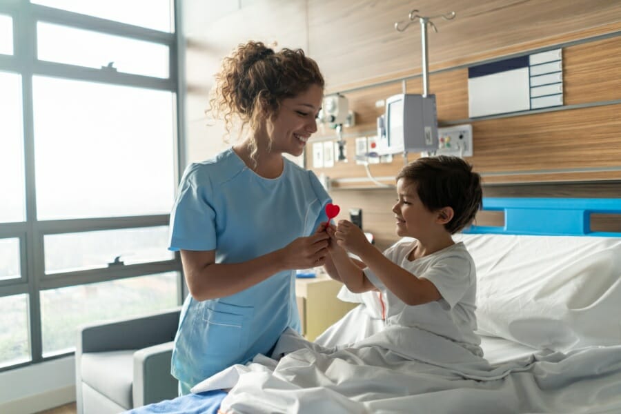rn staffing pleasanton young patient at a doctor's office with a nurse