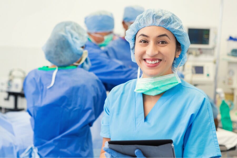 surgical nurse holding a patient's chart