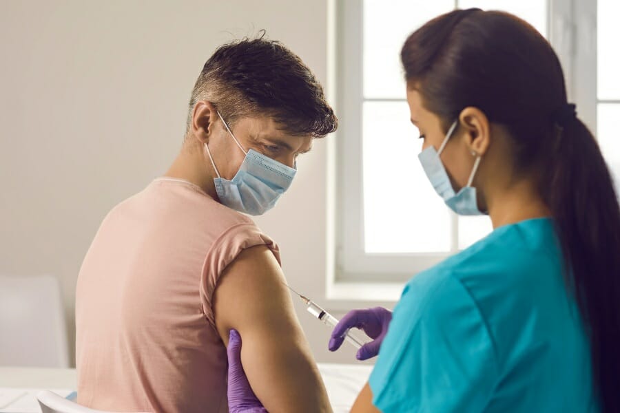 psychiatric facility nurse preparing for an injection