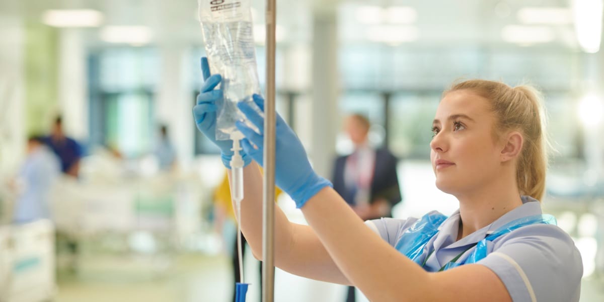 Nurse preparing an IV