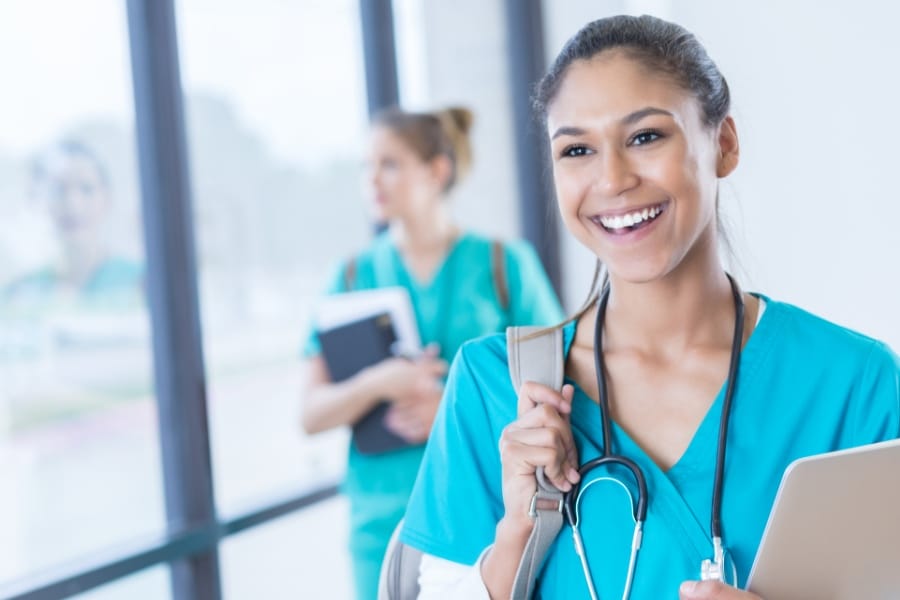 Nurse smiling in a healthcare facility in Fort Lauderdale