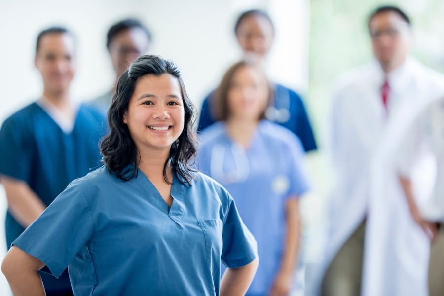 Nurses smiling in a local healthcare facility