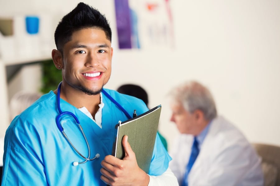 A smiling nurse in a healthcare facility