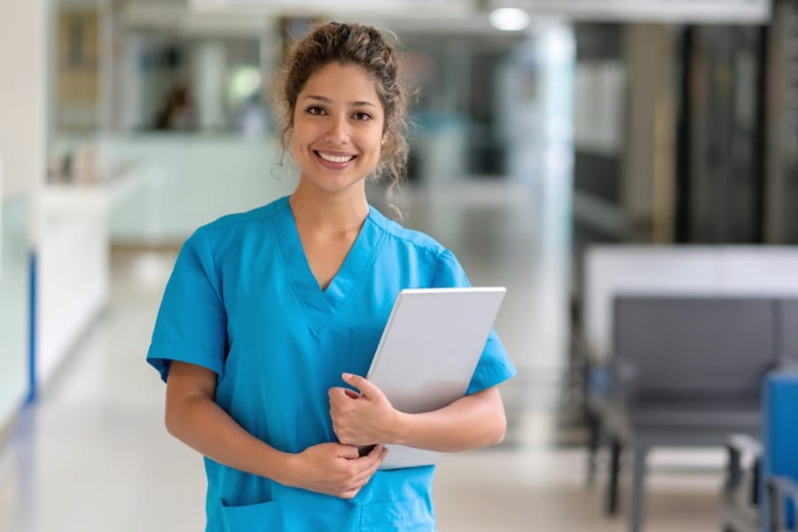 Nurses with a patient's chart