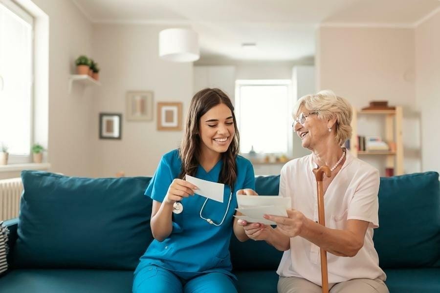 private nurse discussing her patient's chart