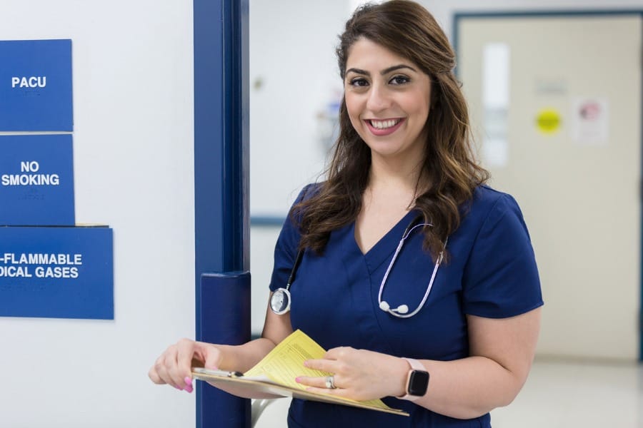 RN checking a patient's record