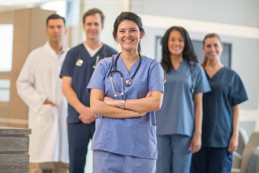 Happy nurses smiling