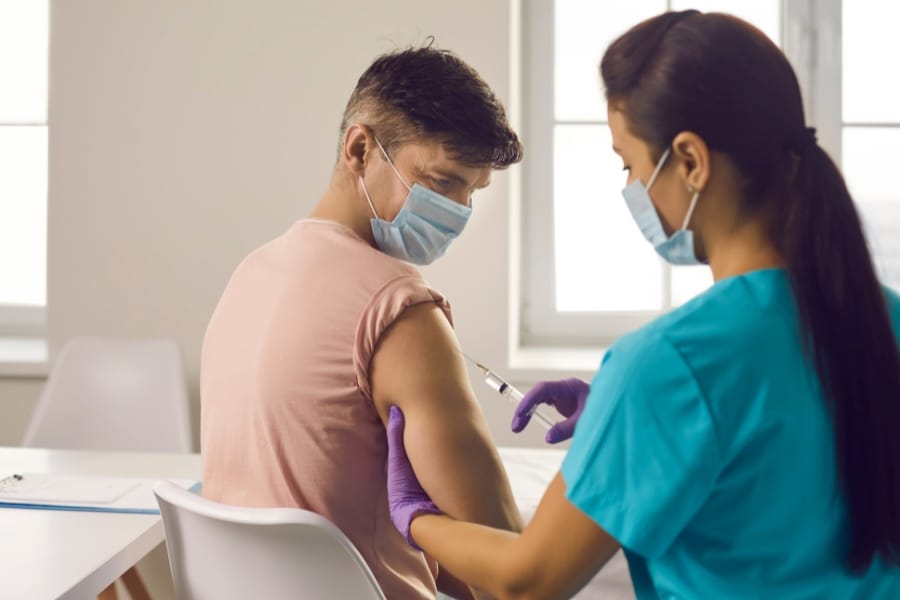 patient receiving an injection