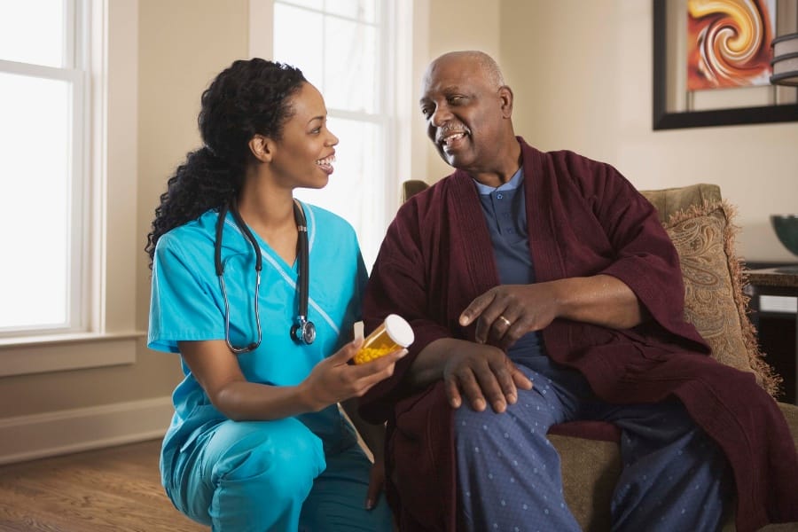 home nurse providing medication