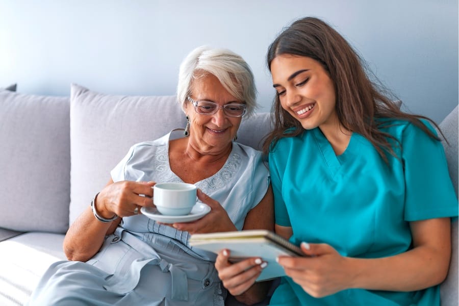 private nurse reading with a patient