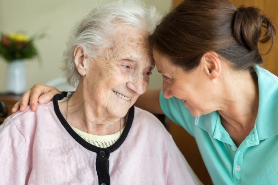 An engaged and helpful nurse for a dementia patient