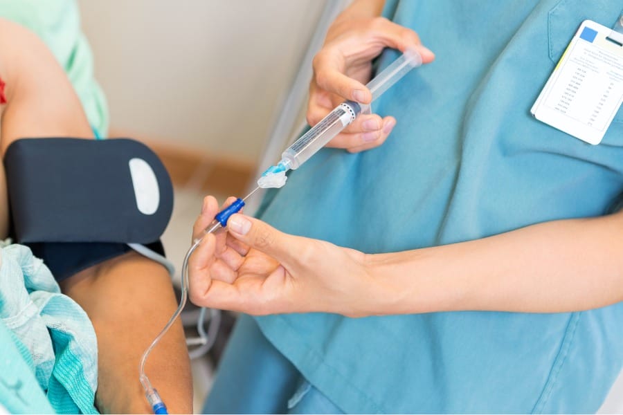 nurse preparing an injection