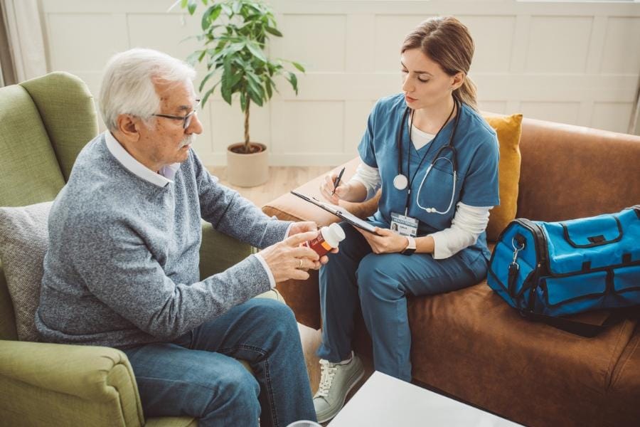 home nursing care in modesto ca home RN and her client discussing medication