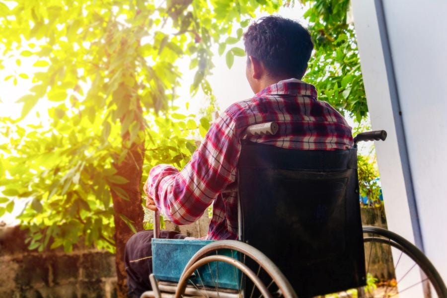 A man with multiple sclerosis in a wheel chair