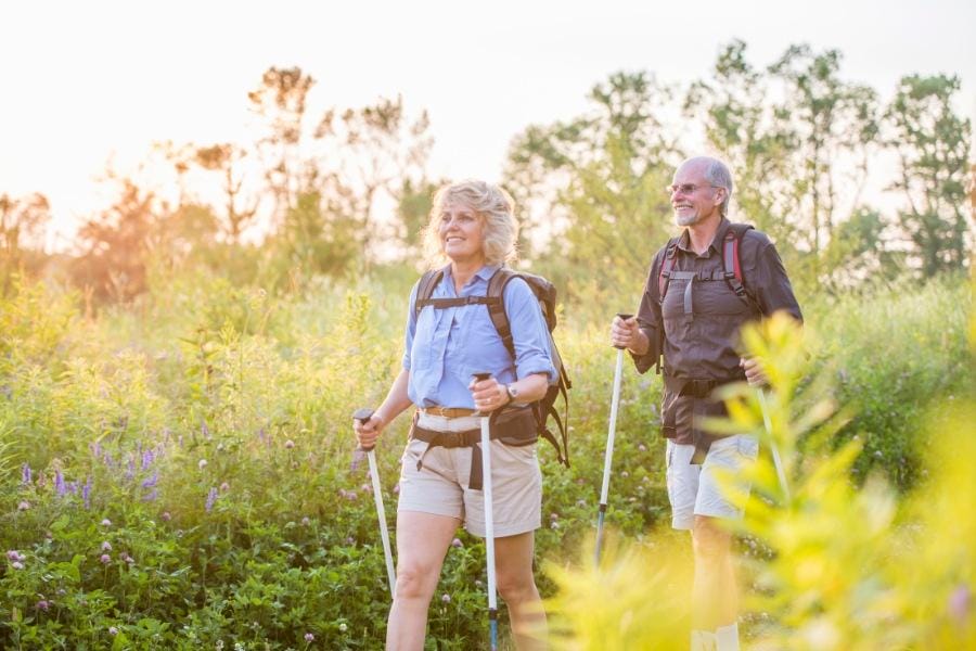 Senior couple walking again after knee surgery