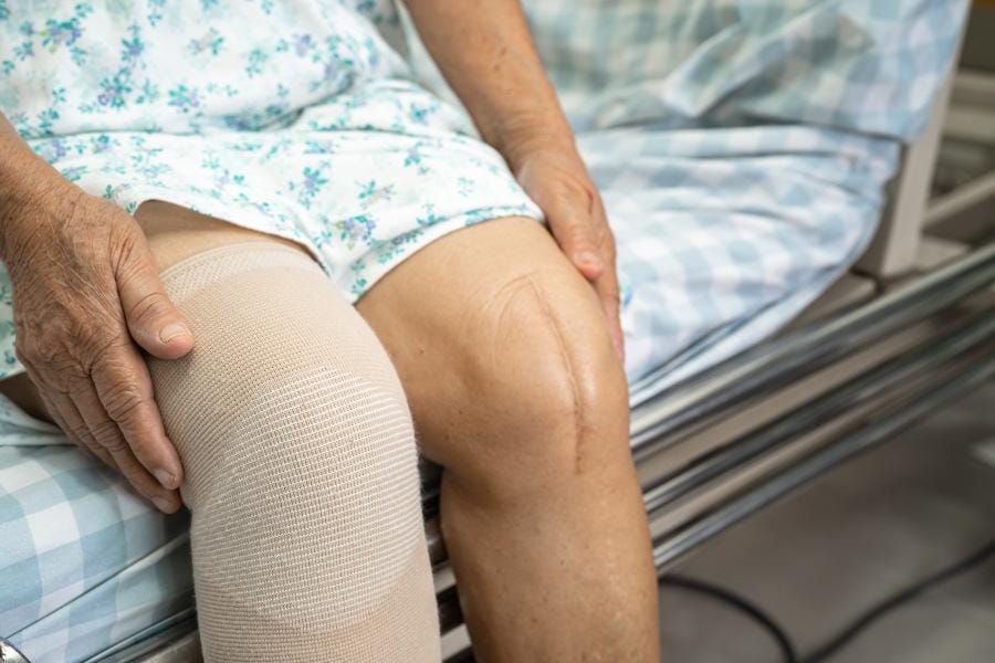 An elderly individual who had knee surgery