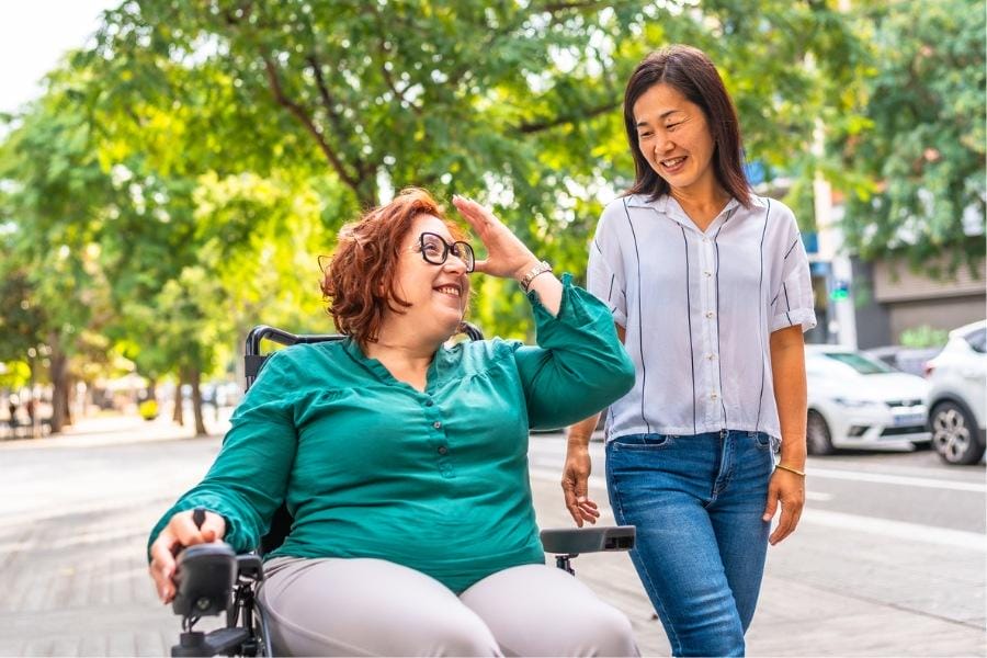 MS home care services A woman with multiple sclerosis and her friend