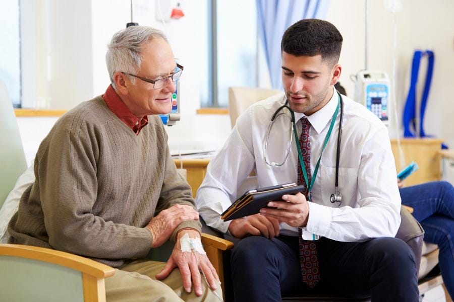 patient talking with their doctor