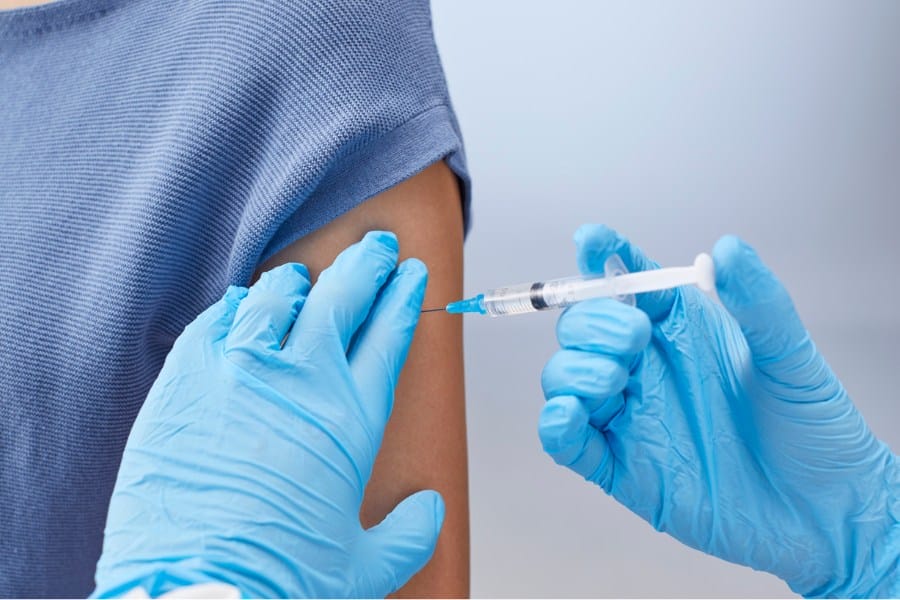 woman receiving the RSV vaccine